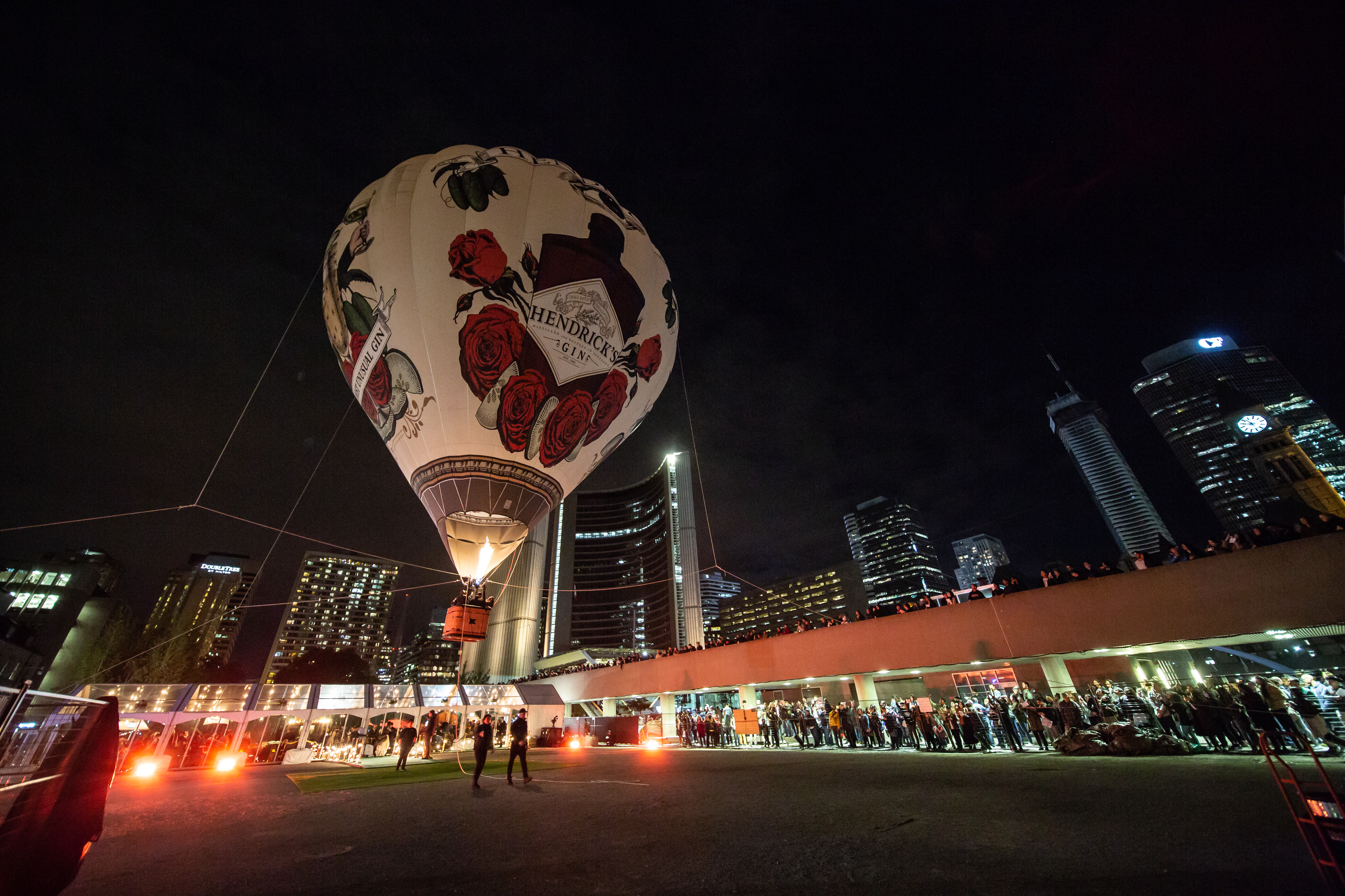 Hendrick's Gin — night balloon crowd